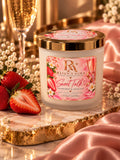 Sweet Talk 8 oz candle in frosted-white vessel with gold lid, strawberries and champagne styling